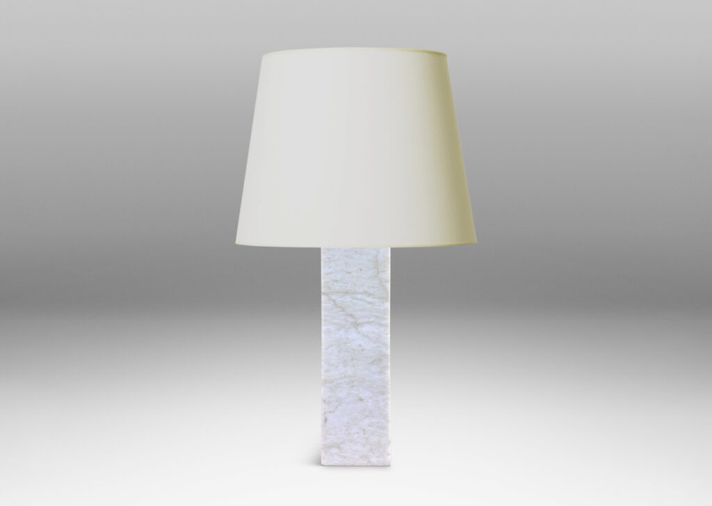 Gallery BAC square pillar forms in pale gray and light brown stone; marble