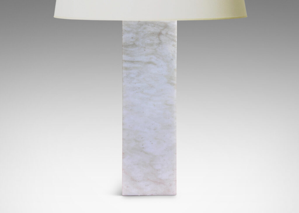 Gallery BAC square pillar forms in pale gray and light brown stone; marble