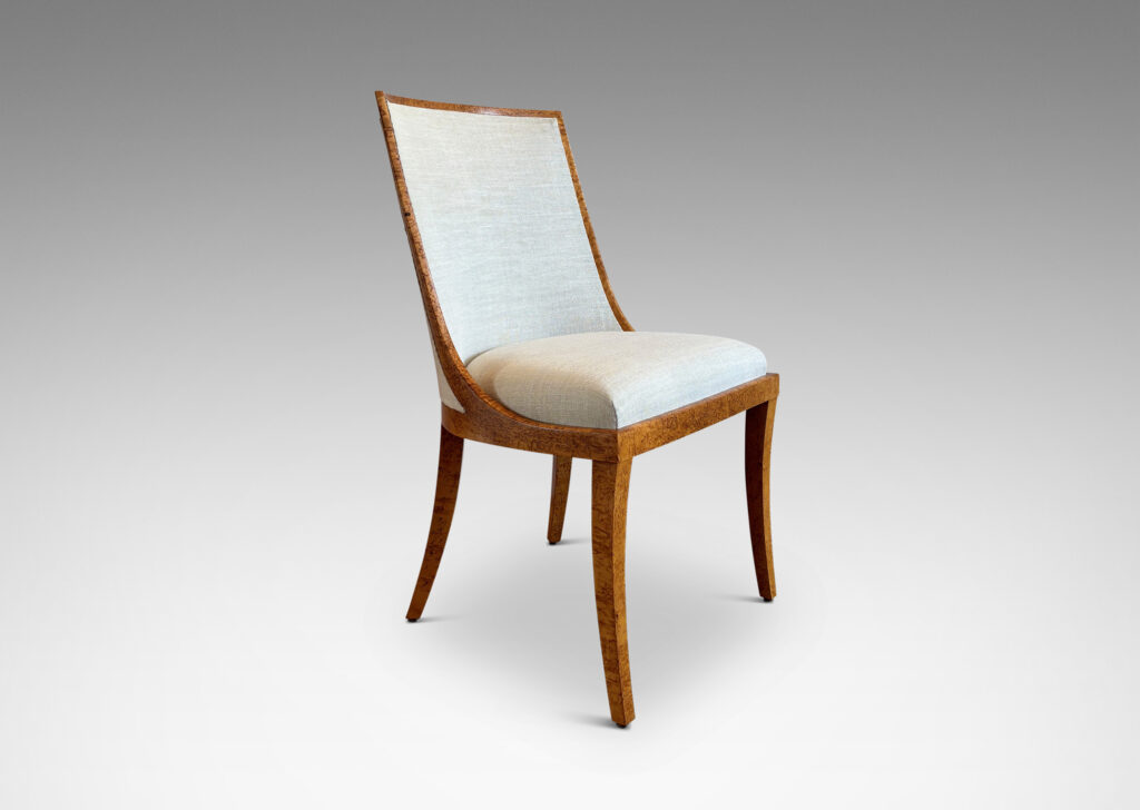 Gallery BAC crafted by the Nordiska Kompaniet workshops for the luxury ocean liner MS Kungsholm, having a curved back and sabered legs, with frames in birch burl