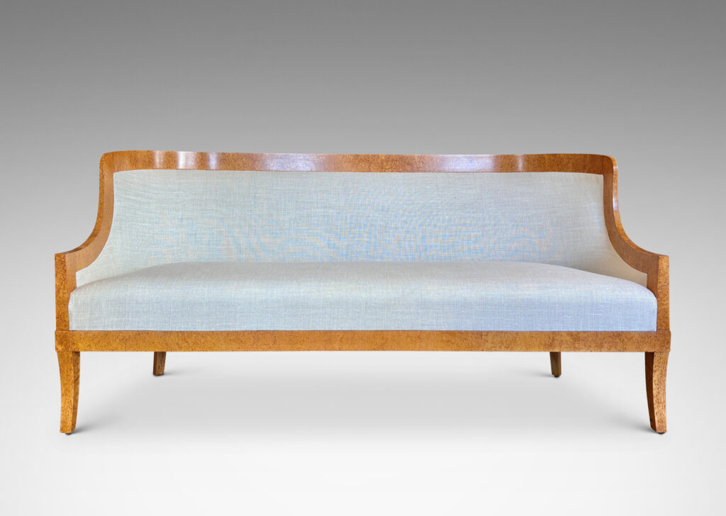 Gallery BAC crafted by the Nordiska Kompaniet workshops for the luxury ocean liner MS Kungsholm, having a curved back, sloped arms and sabered legs, with frames in birch burl