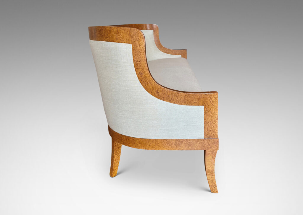 Gallery BAC crafted by the Nordiska Kompaniet workshops for the luxury ocean liner MS Kungsholm, having a curved back, sloped arms and sabered legs, with frames in birch burl