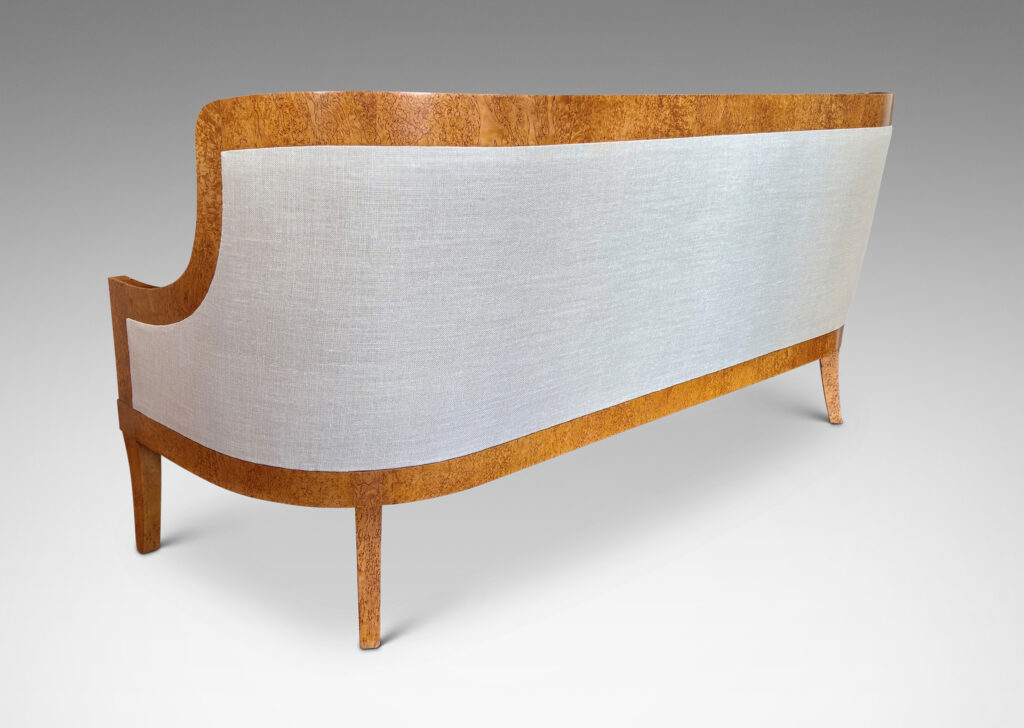 Gallery BAC crafted by the Nordiska Kompaniet workshops for the luxury ocean liner MS Kungsholm, having a curved back, sloped arms and sabered legs, with frames in birch burl