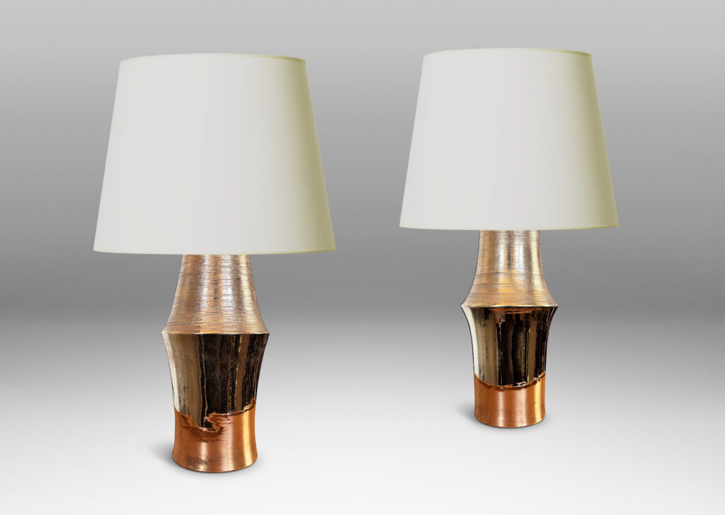 Gallery BAC notched column forms with carved ridging detail; earthenware with a brilliant gold luster glaze