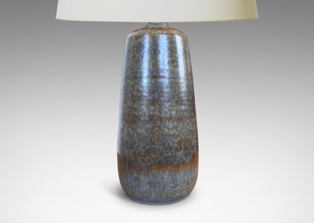 Gallery BAC organically modeled cylindrical form glazed in blue-gray with subtle flowing brown stripes, stoneware