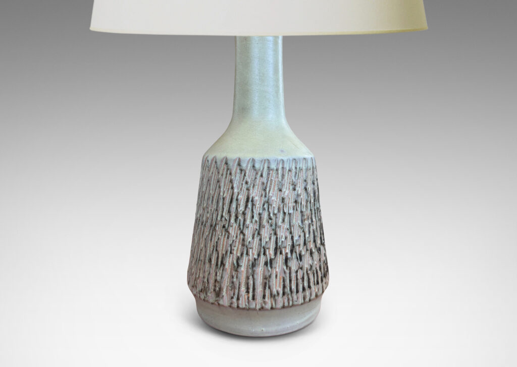 Gallery BAC flared drum forms with rustically textured sides and tall necks, glazed in a matte pale khaki tone; earthenware