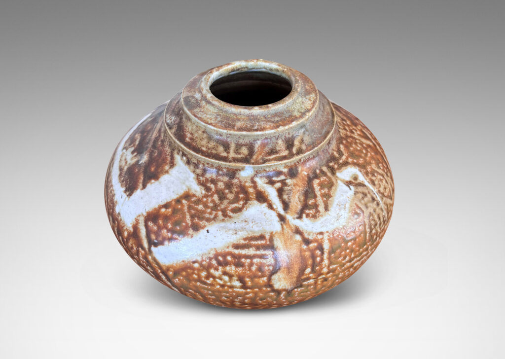 Gallery BAC compressed globe form with notch-articulated mouth, glazed in golden-tan with ivory brushstrokes encircling shoulder