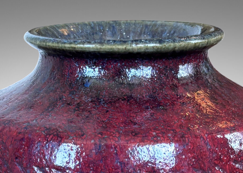 Gallery BAC cinched form with carved diagonals, glazed in thick flowing oxblood burgundy over blue-brown