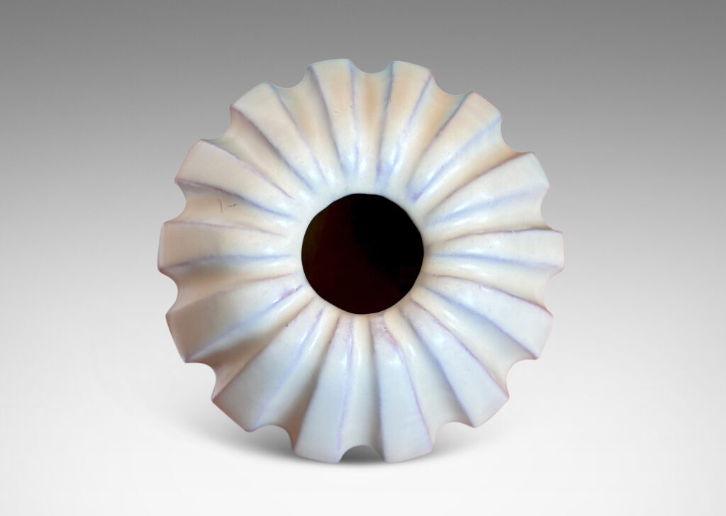 Gallery BAC vertically fluted bulbous form in a pale yellow-ivory glaze