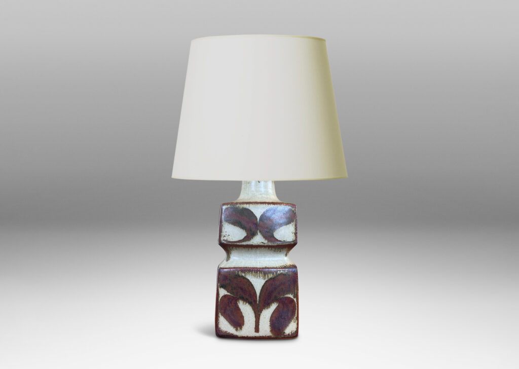 Gallery BAC tiered squared form, glazed in a pale warm gray with foliate motifs in rust luster