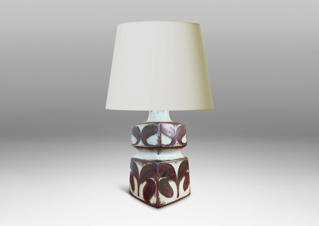 Gallery BAC tiered squared form, glazed in a pale warm gray with foliate motifs in rust luster