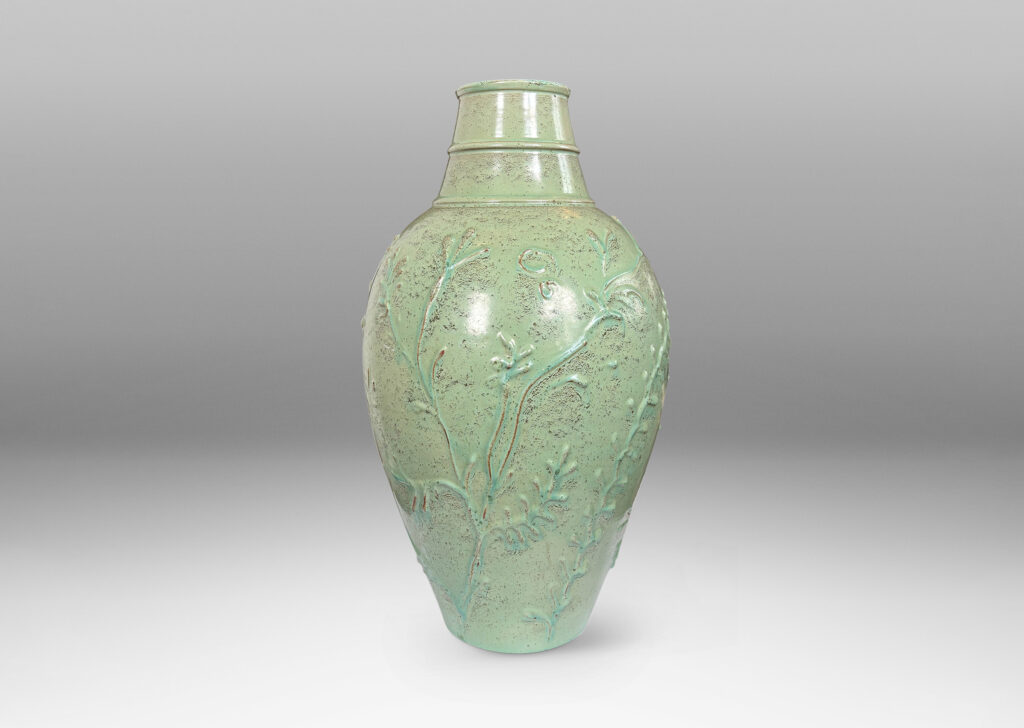 Gallery BAC tapered form with wide neck and abstract foliate reliefs, glazed in a bright celadon