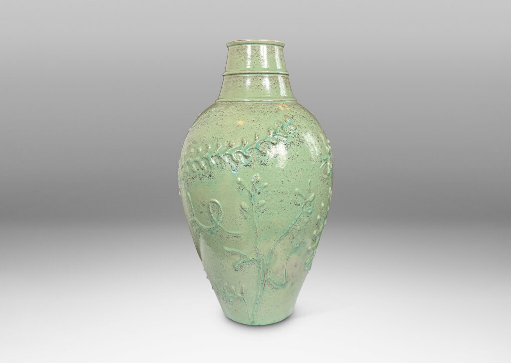 Gallery BAC tapered form with wide neck and abstract foliate reliefs, glazed in a bright celadon