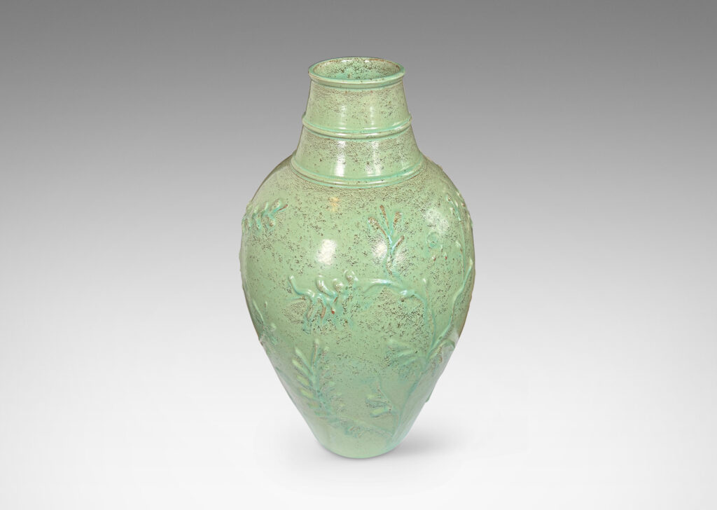 Gallery BAC tapered form with wide neck and abstract foliate reliefs, glazed in a bright celadon