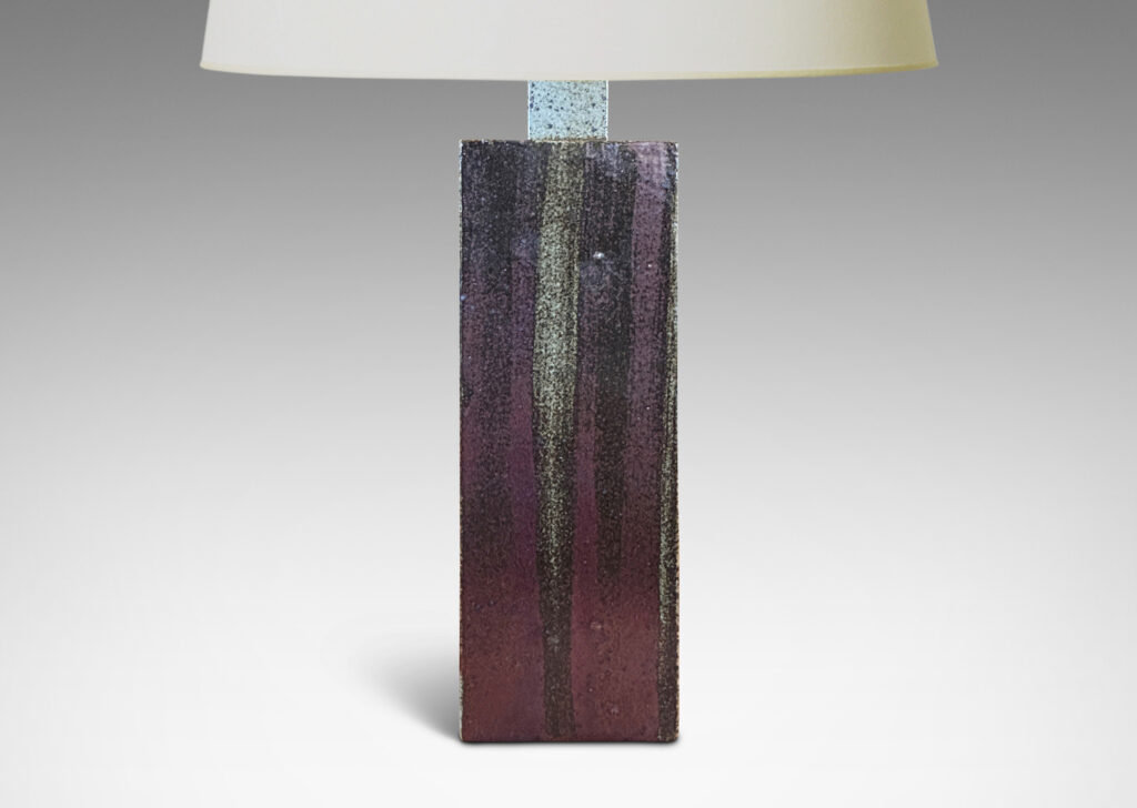 Gallery BAC two floating rectangular planes connected by a central pillar, glazed in dappled gray-brown with brushstroked of black-red luster