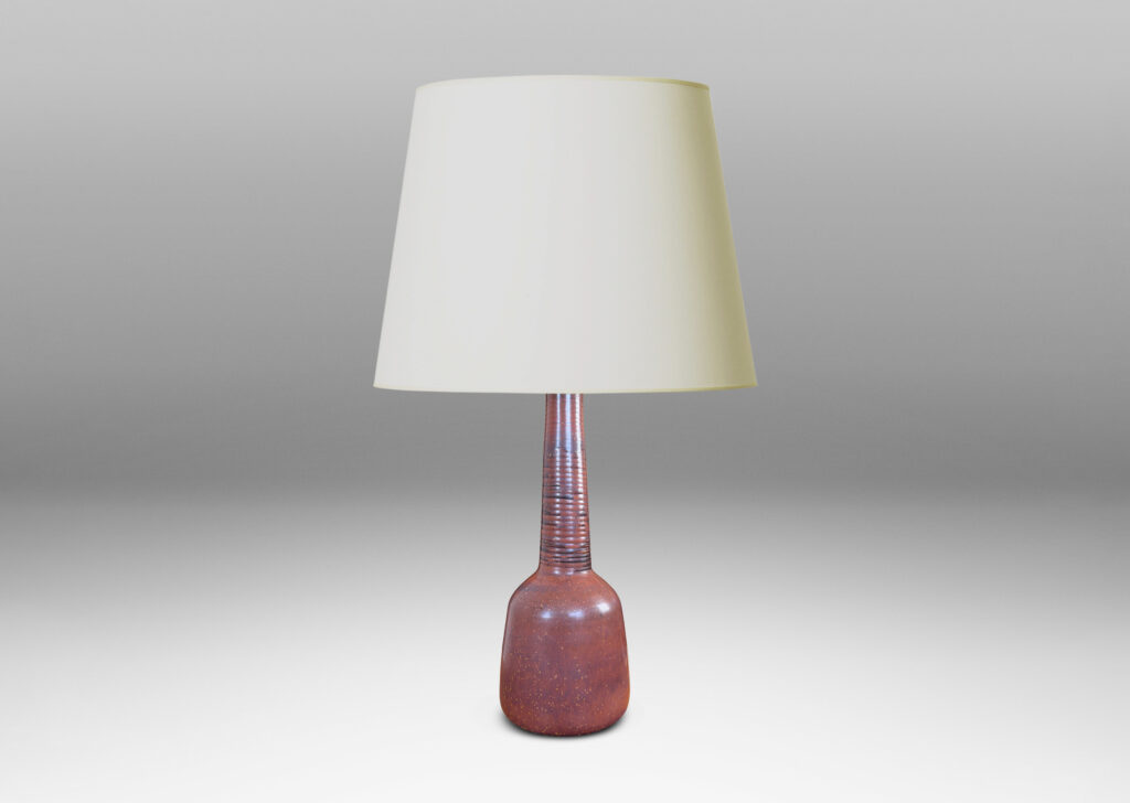 Gallery BAC gumdrop-like three-quarters ovoid form with tall ridged neck, glazed in a rich warm burnt sienna brown