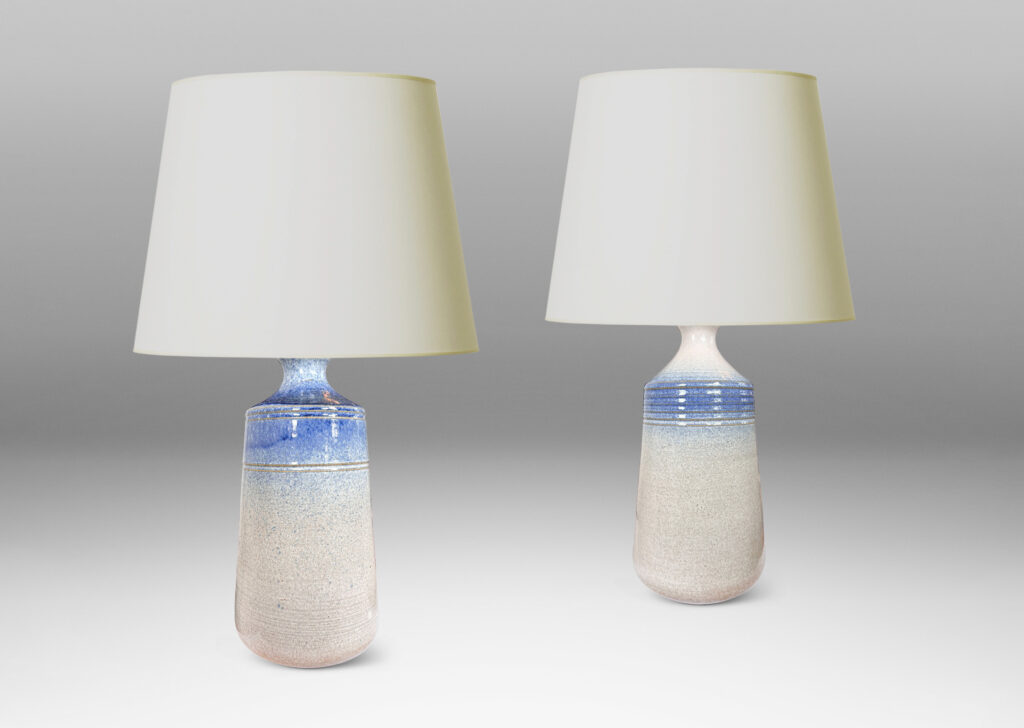 Gallery BAC subtly flared cylinder forms, glazed in white-pale gray and airbrushed delft blue