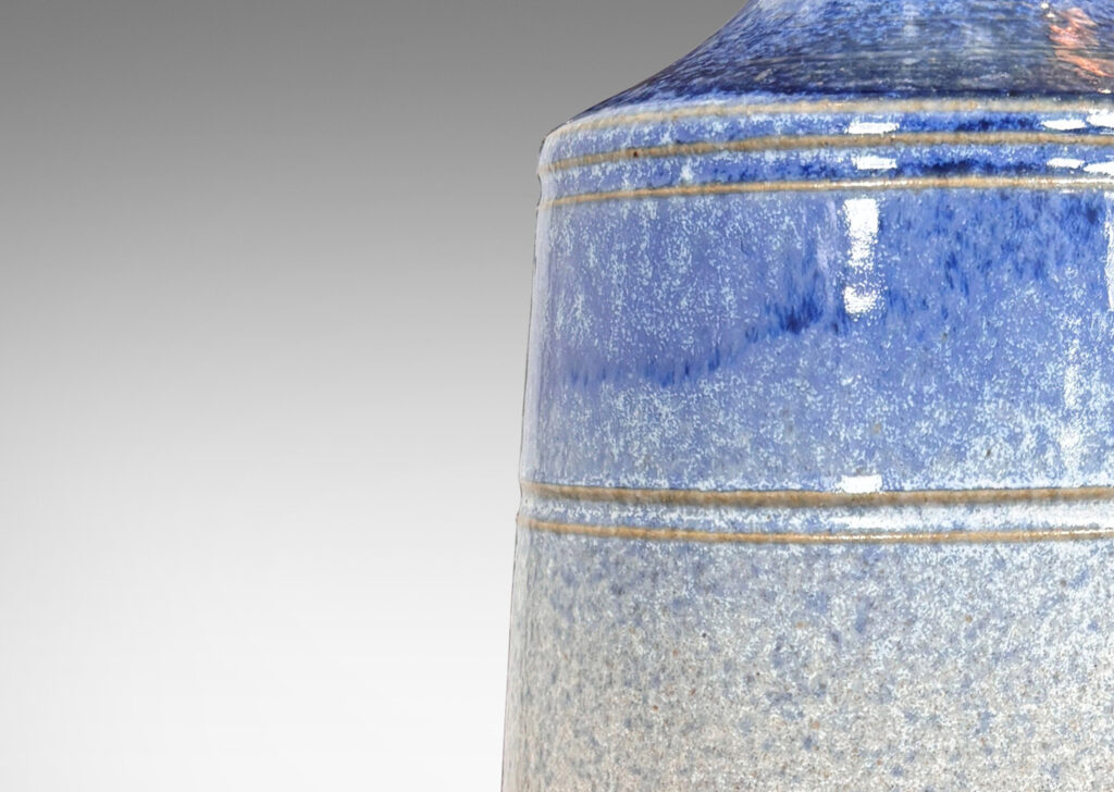 Gallery BAC subtly flared cylinder forms, glazed in white-pale gray and airbrushed delft blue