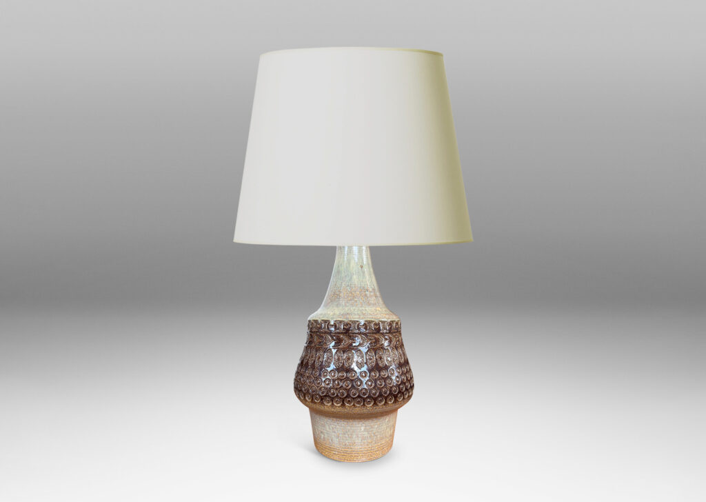 Gallery BAC organically modeled forms with impressed circle and ogival motifs, glazed in tan and deep brown