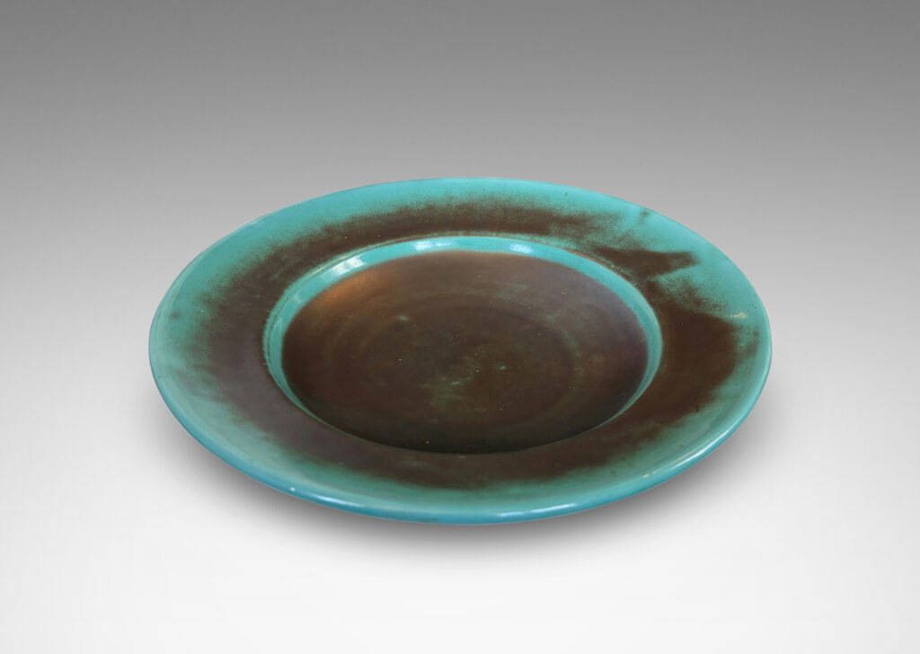 Gallery BAC nverted dome center with wide angled border, glazed in the pottery’s signature cerulean-green and metallic gray-blue