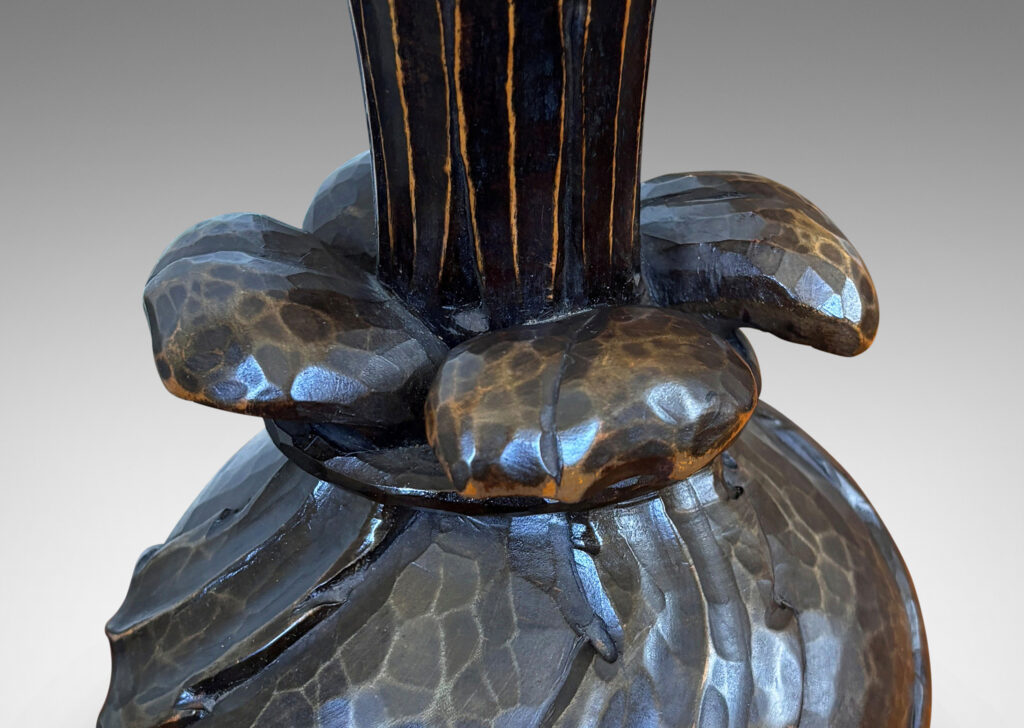 Gallery BAC compressed globe body on feet, with sprouting petal forms; carved wood