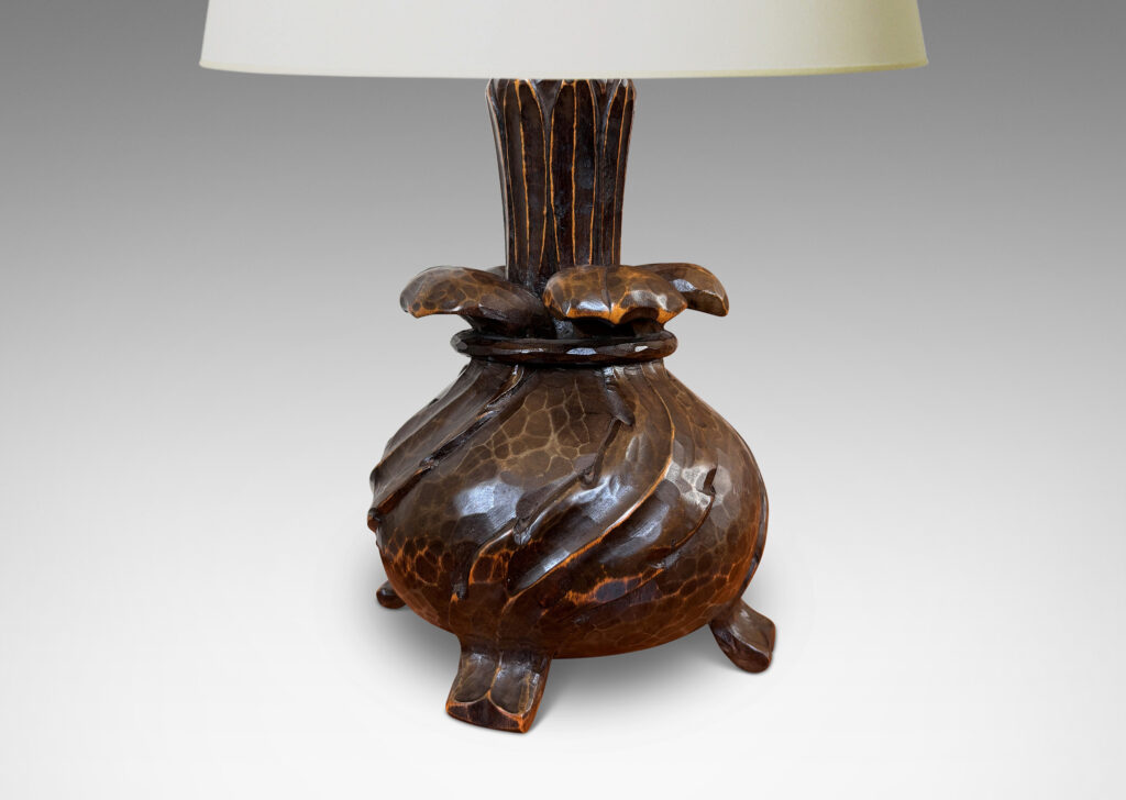 Gallery BAC compressed globe body on feet, with sprouting petal forms; carved wood