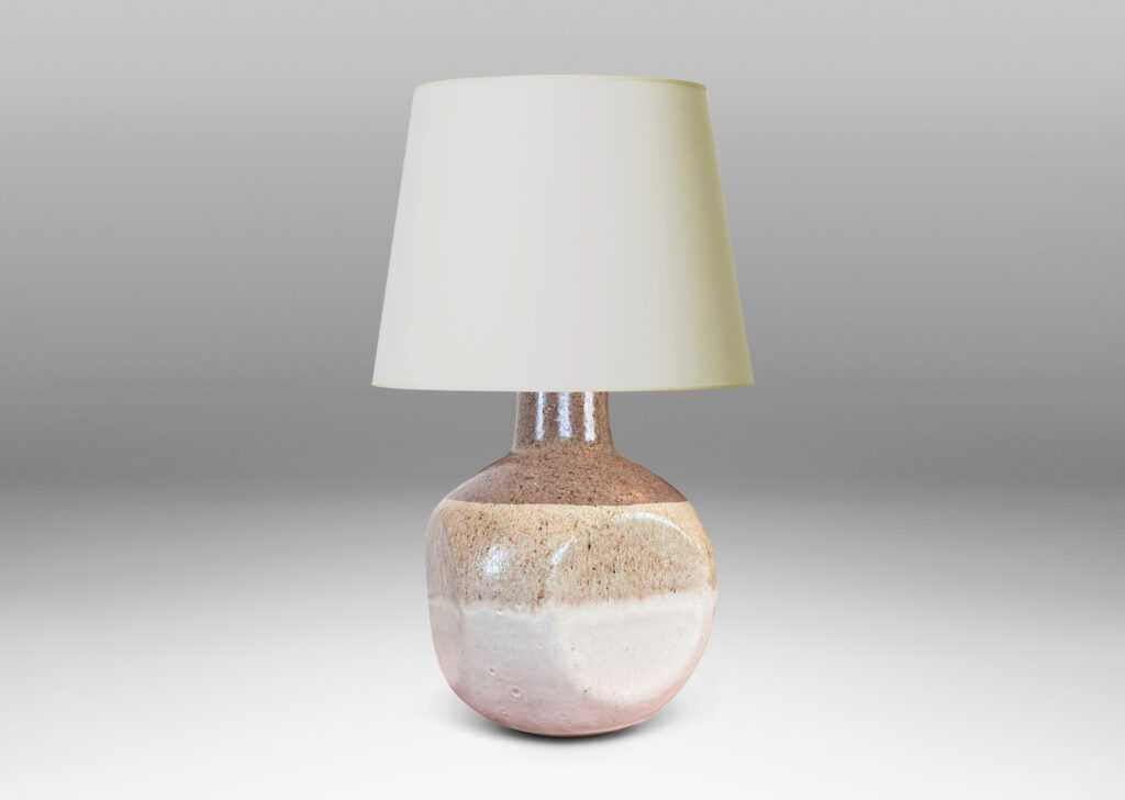 Gallery BAC spherical form squared with four flattened sides, in speckled gray, with speckled tan and ivory glazes