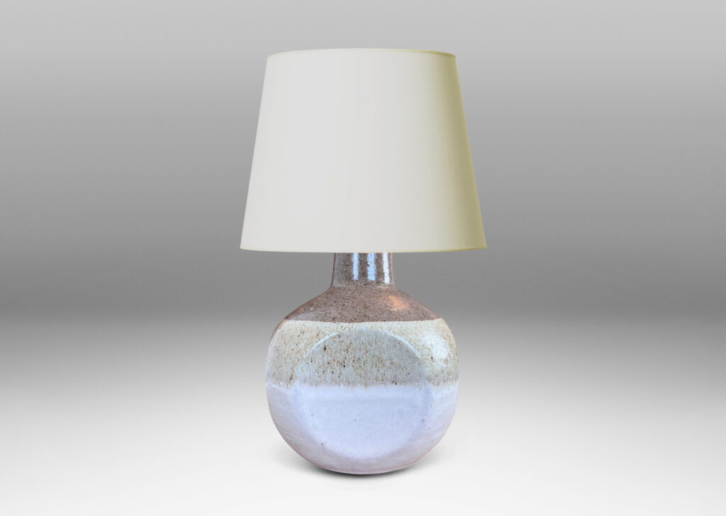 Gallery BAC spherical form squared with four flattened sides, in speckled gray, with speckled tan and ivory glazes