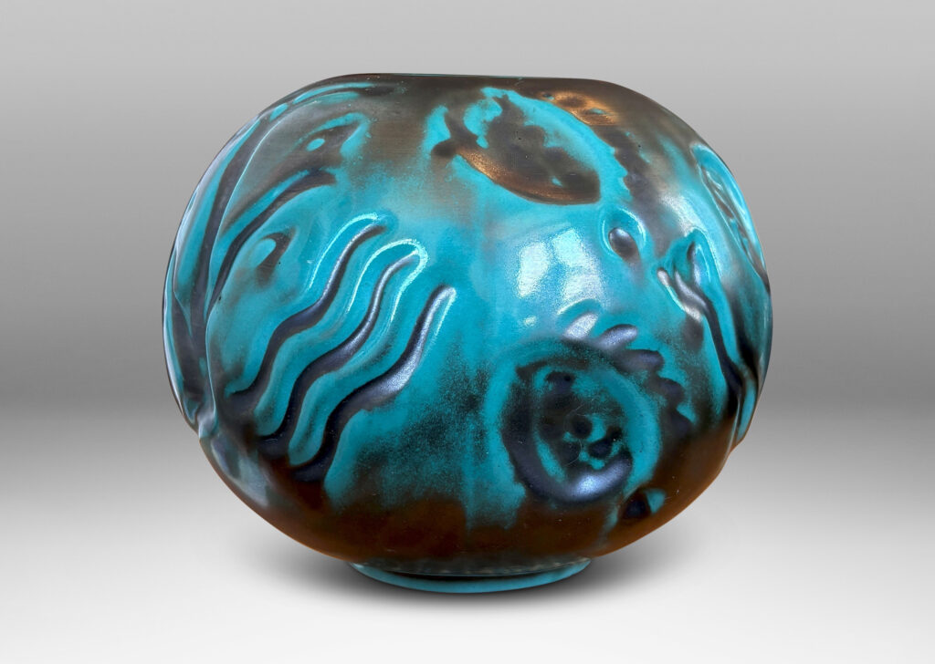 Gallery BAC compressed globe form with fish and water floral in bas relief, in a tonal blue-green copper oxide