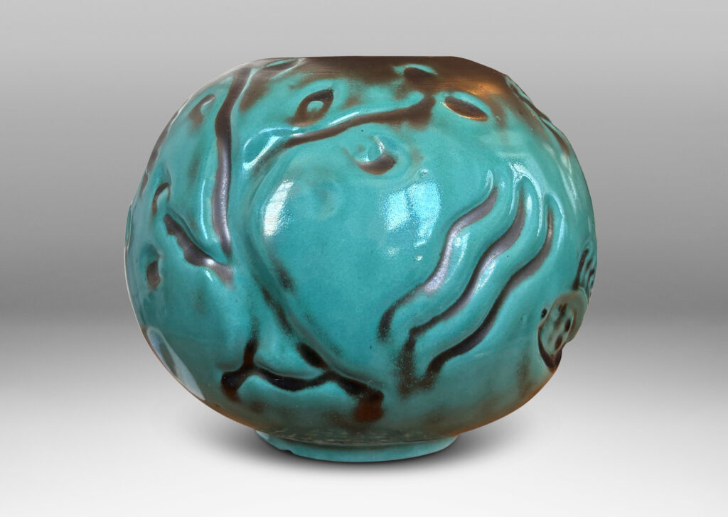 Gallery BAC compressed globe form with fish and water floral in bas relief, in a tonal blue-green copper oxide