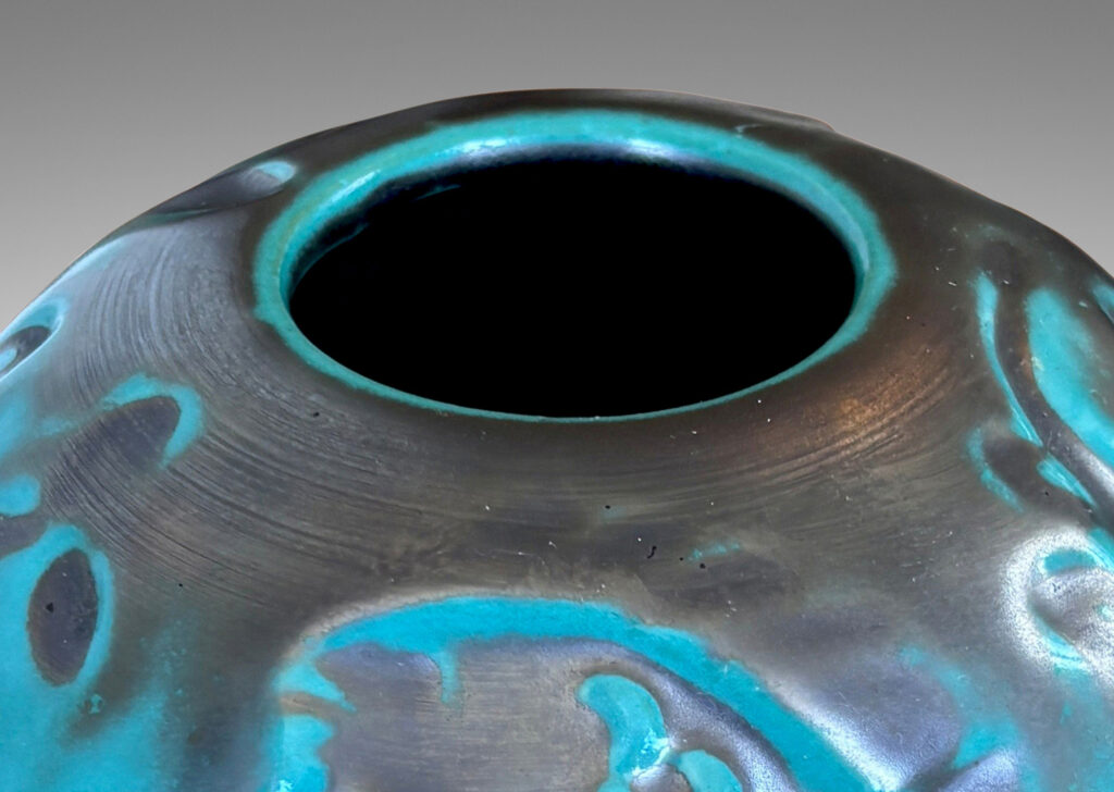 Gallery BAC compressed globe form with fish and water floral in bas relief, in a tonal blue-green copper oxide