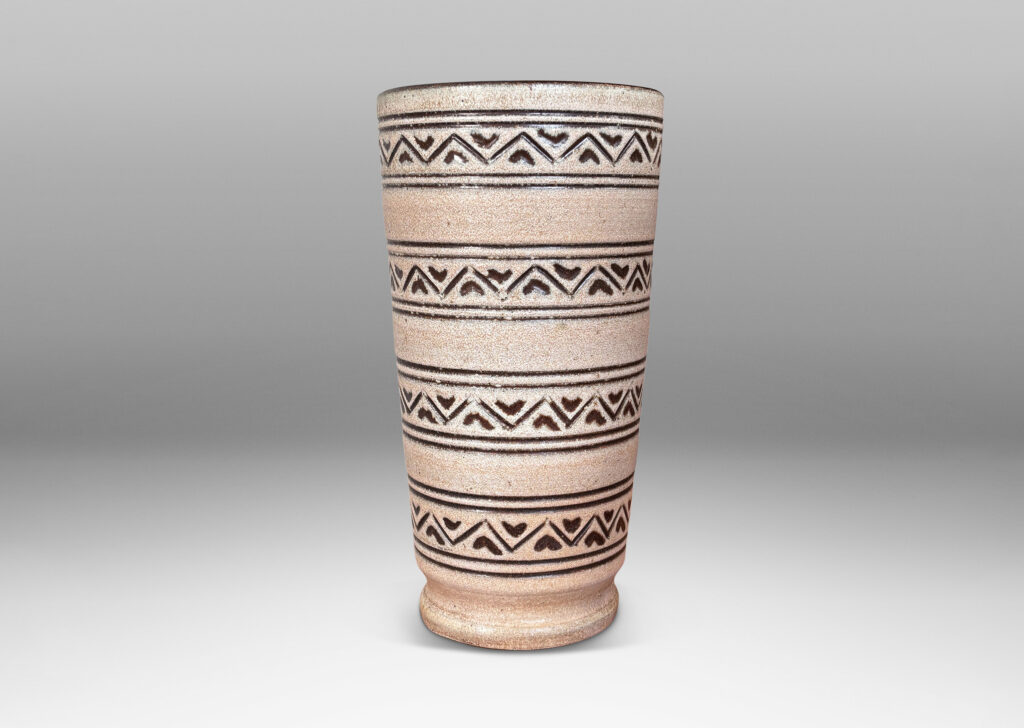 Gallery BAC tall tapered cylindrical forms, with carved pinstripes and zigzag bands, partially glazed brown ornaments and interior