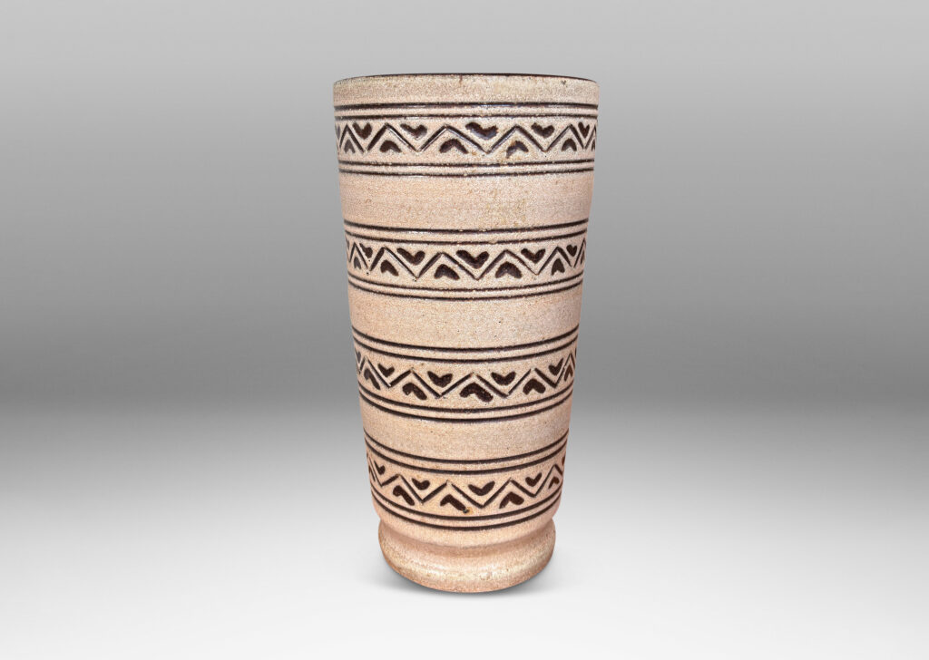 Gallery BAC tall tapered cylindrical forms, with carved pinstripes and zigzag bands, partially glazed brown ornaments and interior