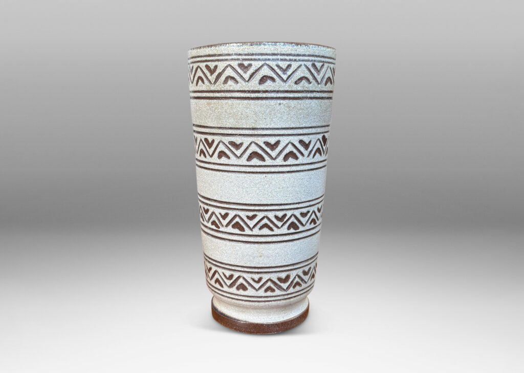 Gallery BAC tall tapered cylindrical forms, with carved pinstripes and zigzag bands, partially glazed brown ornaments and interior