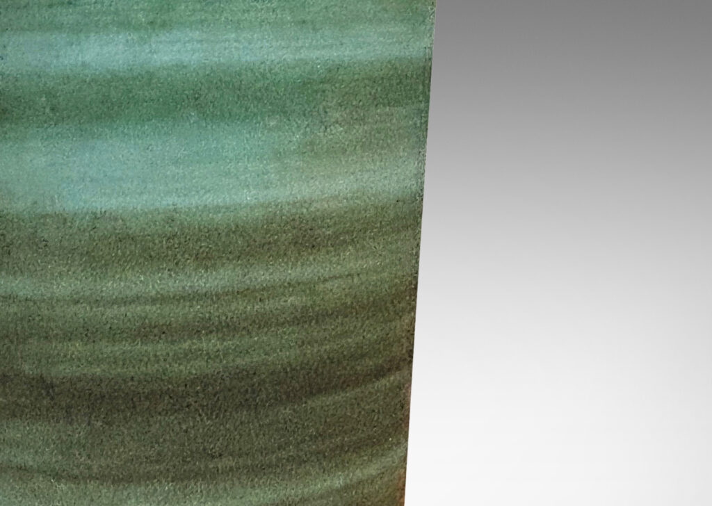 Gallery BAC cylindrical form with gently flared lip, striae glazed in evergreen and jade green tones, with a pale gray interior