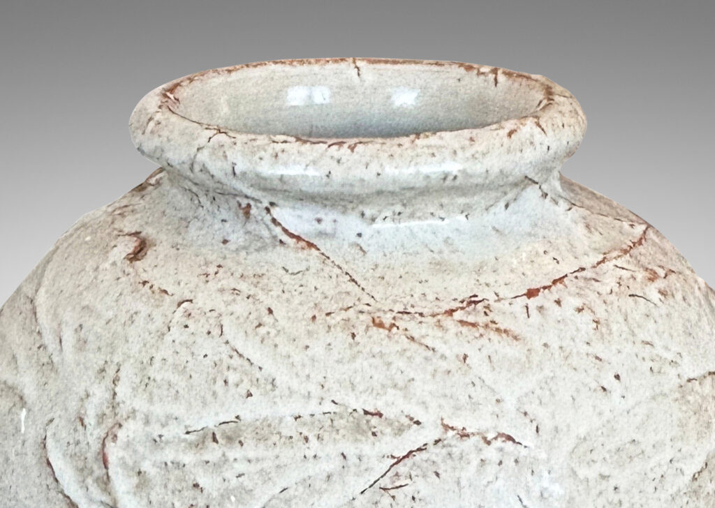Gallery BAC tapered form with lively rustic texture, glazed in a very pale gray with hints of brown