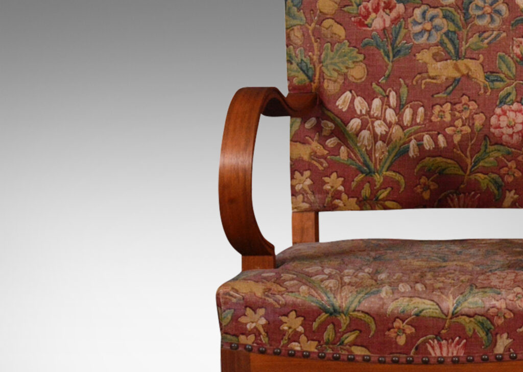 Gallery BAC exuberant rolling arms and gently swagged seat rails with square backs and orthogonal legs