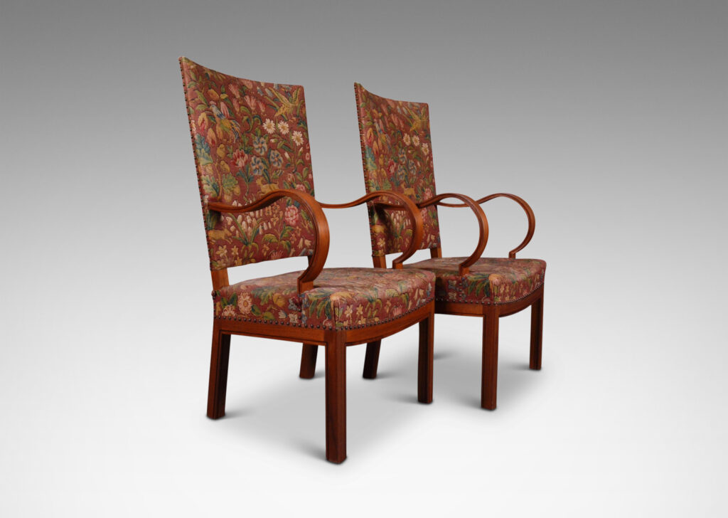 Gallery BAC exuberant rolling arms and gently swagged seat rails with square backs and orthogonal legs
