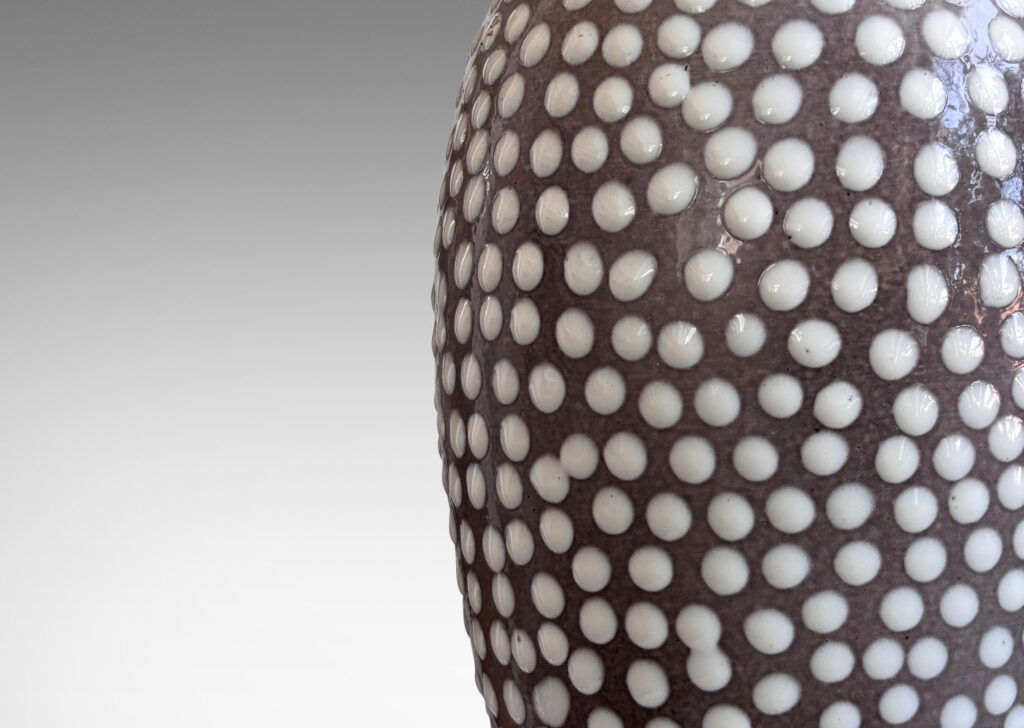 Gallery BAC tapered ovoid forms in gray glaze with applied white polka dots