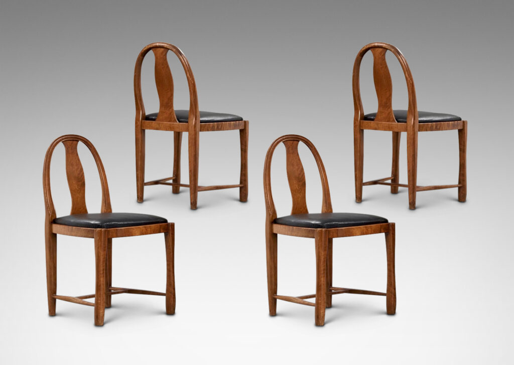 Gallery BAC having ovoid loop backs with Baltic style splats and sculpted legs; birch