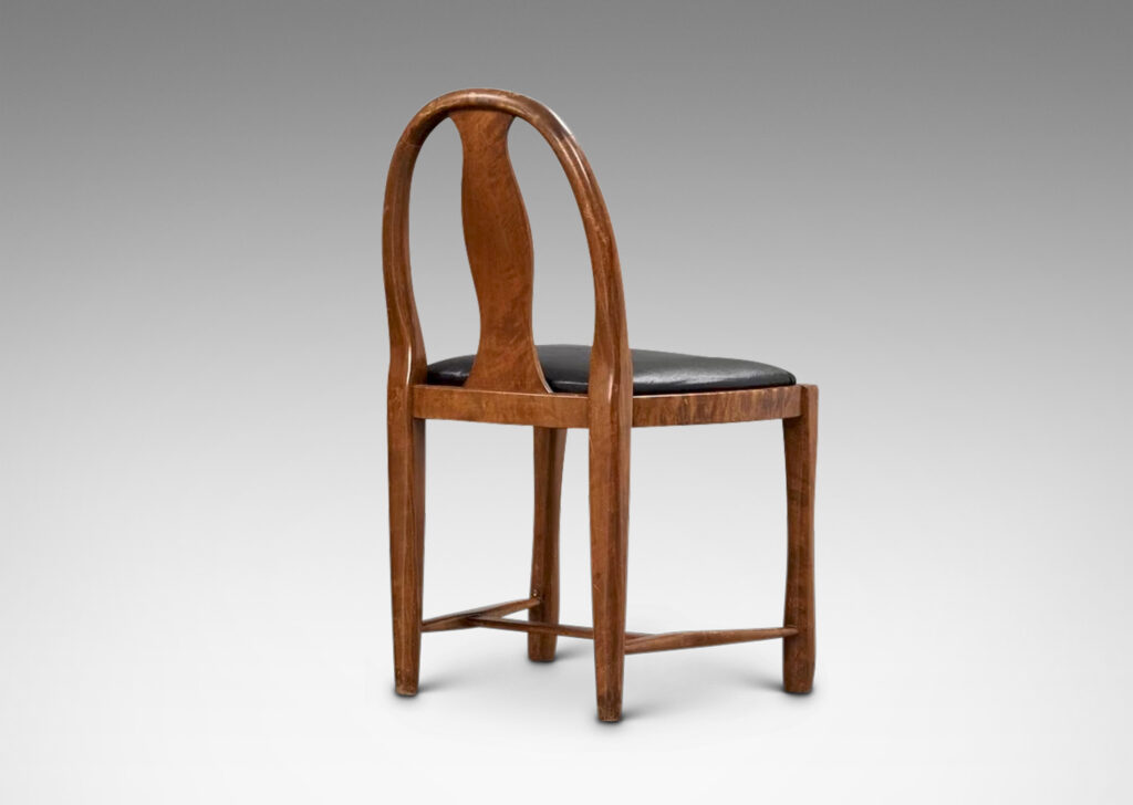 Gallery BAC having ovoid loop backs with Baltic style splats and sculpted legs; birch