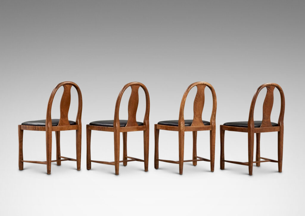 Gallery BAC having ovoid loop backs with Baltic style splats and sculpted legs; birch