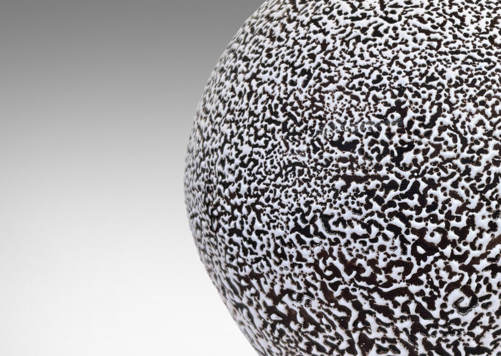 Gallery BAC tapered globe form, glazed in a white “crispé” layer over matte ivory
