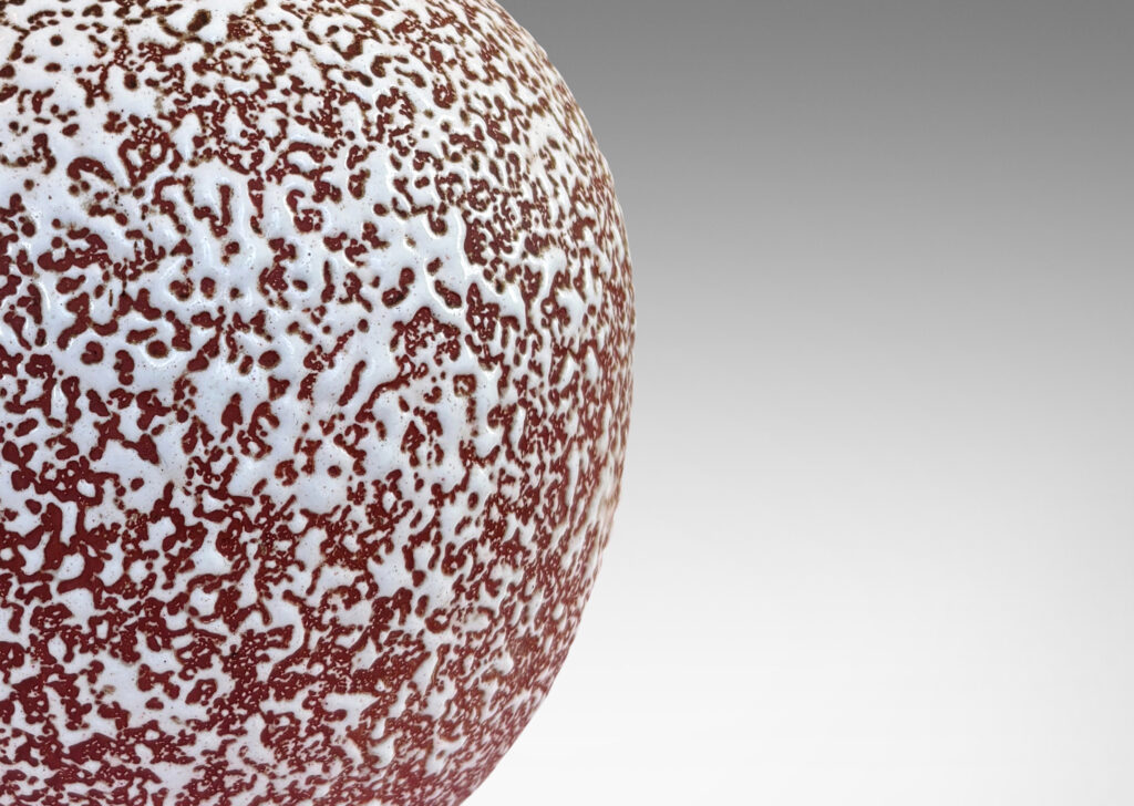 Gallery BAC apered globe form in salmon tint ceramic partially glazed with white “crispé” layer