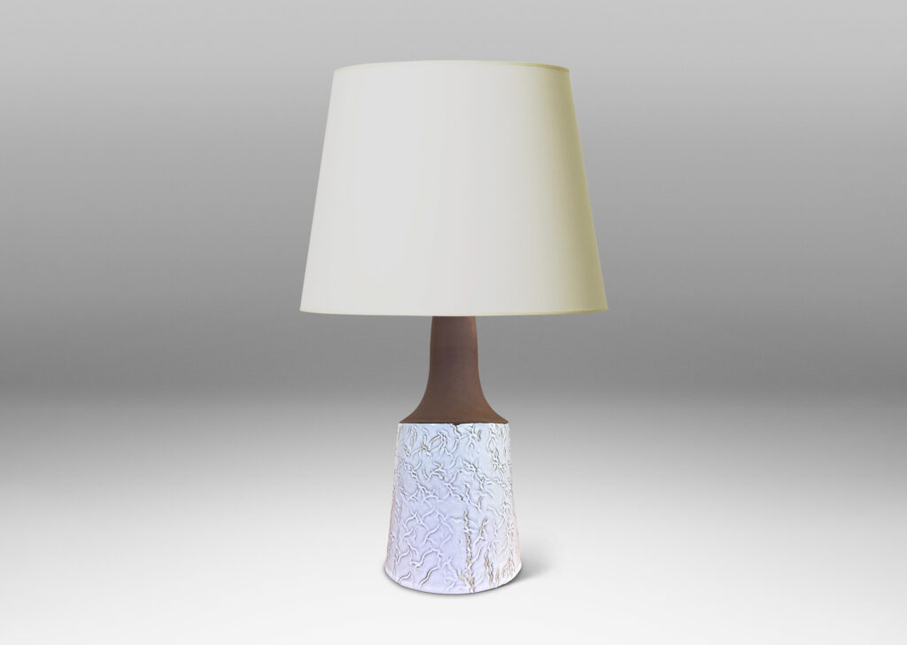 Gallery BAC slant-sided cylindrical forms with impressed texture and sprouting necks, glazed in shiny white and matte brown