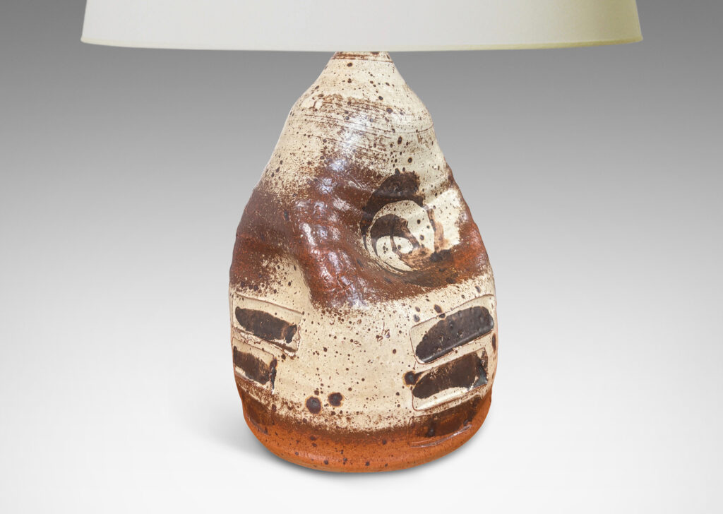 Gallery BAC beehive-like form pressed in on four sides, brushily glazed in pale gray with abstract motifs in dark brown