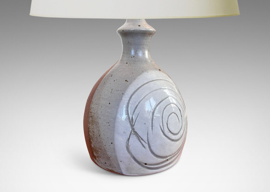 Gallery BAC half ovoid gumdrop form with sprouting neck, partially glazed in medium and light gray with sgraffito spirals