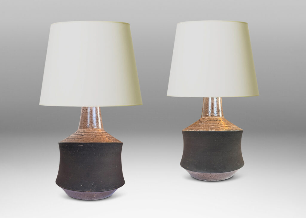 Gallery BAC cove-sided drum forms in a dark matte brown, with angled top and reveal glazed in a semi-shiny light brown