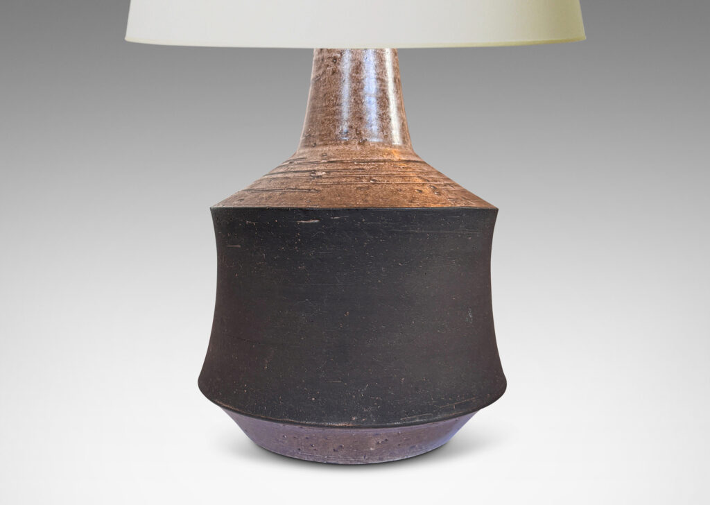 Gallery BAC cove-sided drum forms in a dark matte brown, with angled top and reveal glazed in a semi-shiny light brown