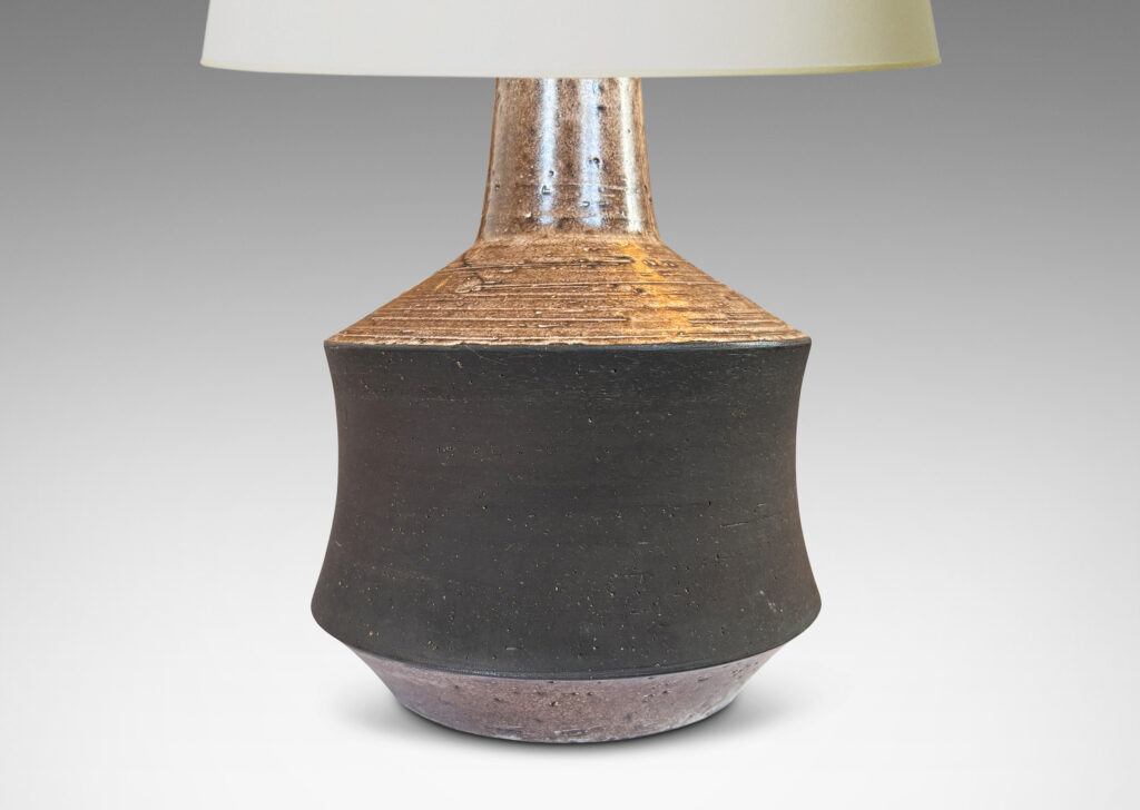 Gallery BAC cove-sided drum forms in a dark matte brown, with angled top and reveal glazed in a semi-shiny light brown