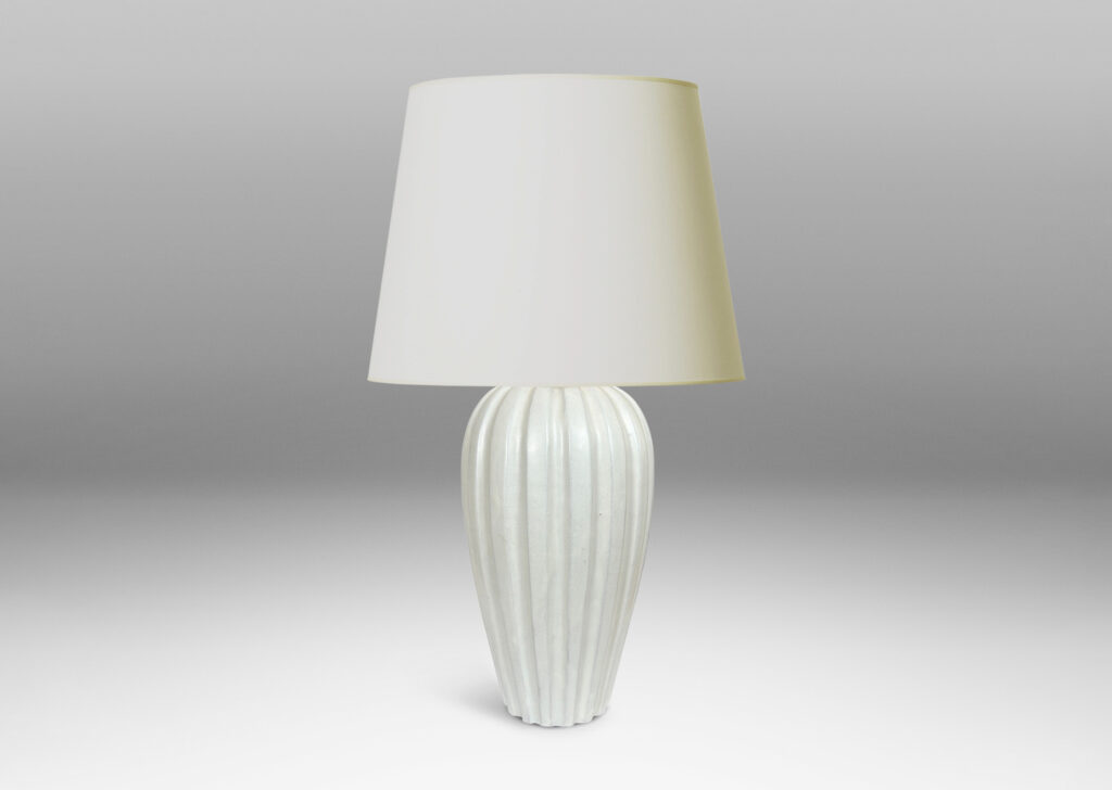 Gallery BAC vertically fluted bulbous form in an eggshell finish ivory glaze